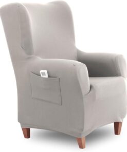 Textilhome Funda Sillón Orejero Elástica TEIDE Ajustable Protector Marfil | Funda elástica para sillón orejero 70 a 110cm con ajuste perfecto, protección diaria y espumas antideslizantes incluidas.