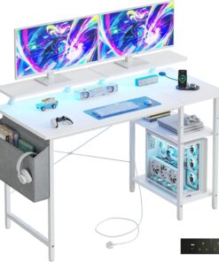 Escritorio para juegos con luces LED y tomas de corriente, escritorio reversible para computadora con estantes de almacenamiento y soportes para monitor duales, para oficina en casa y estudio